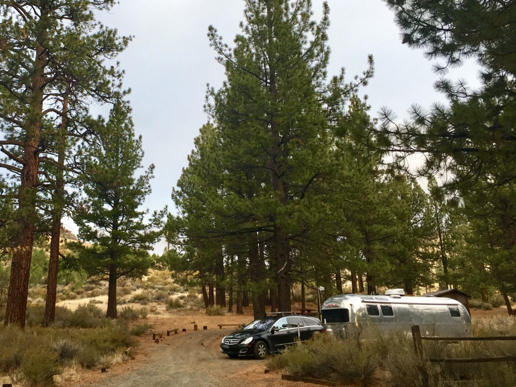 1979 Airstream Excella 500 set up at a scenic overlook campsite