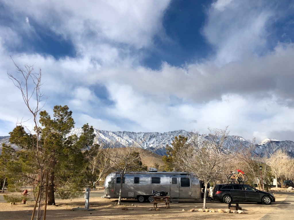Renovated vintage Airstream at pine forest campground