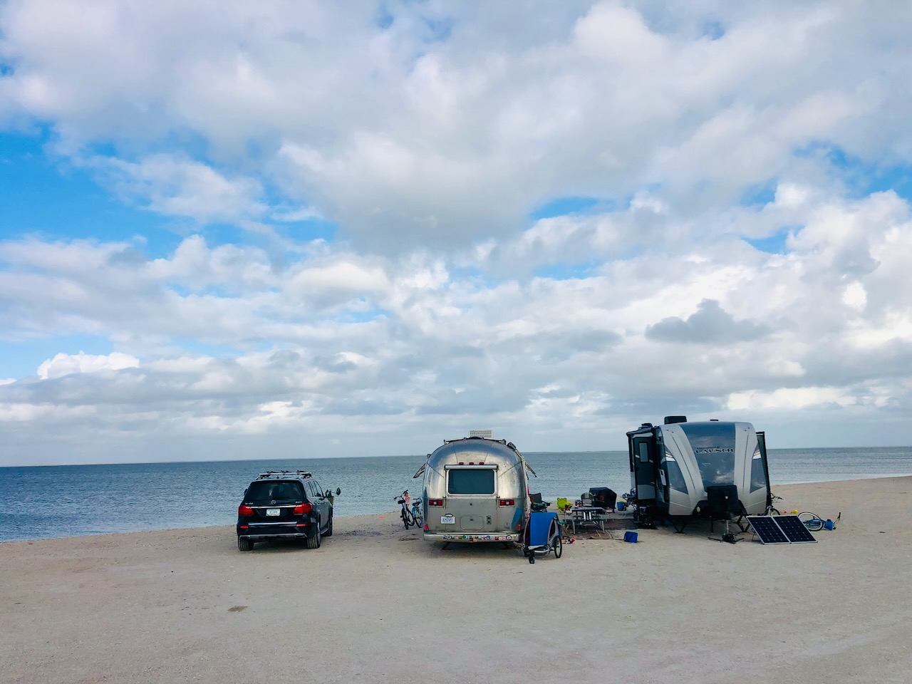 Airstream parked on the beach