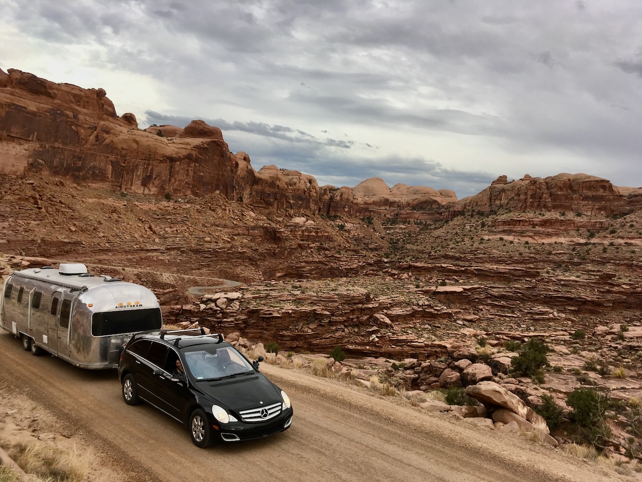 Airstream being towed through canyon roads